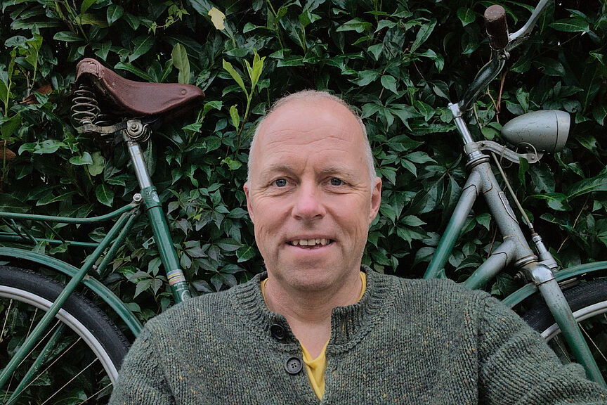 Karsten Pehlke Karsten vor einem alten Fahrrad